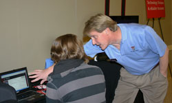 IT Staff helping Students
