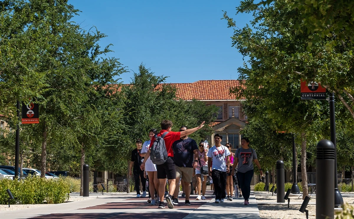 Campus tour guide with K-8 group.