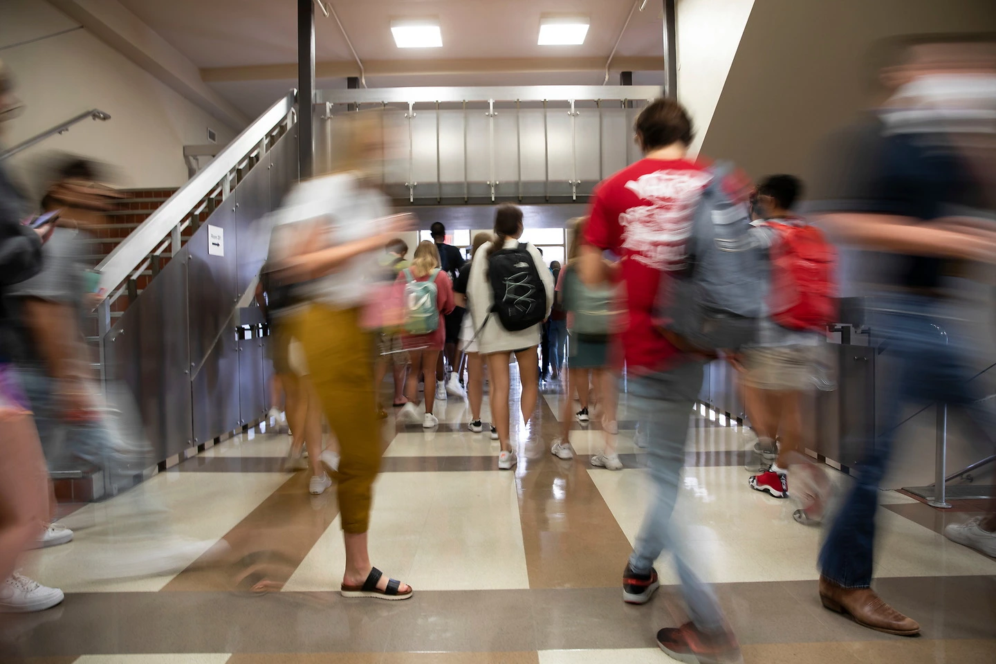 Students in stairway with motion blur