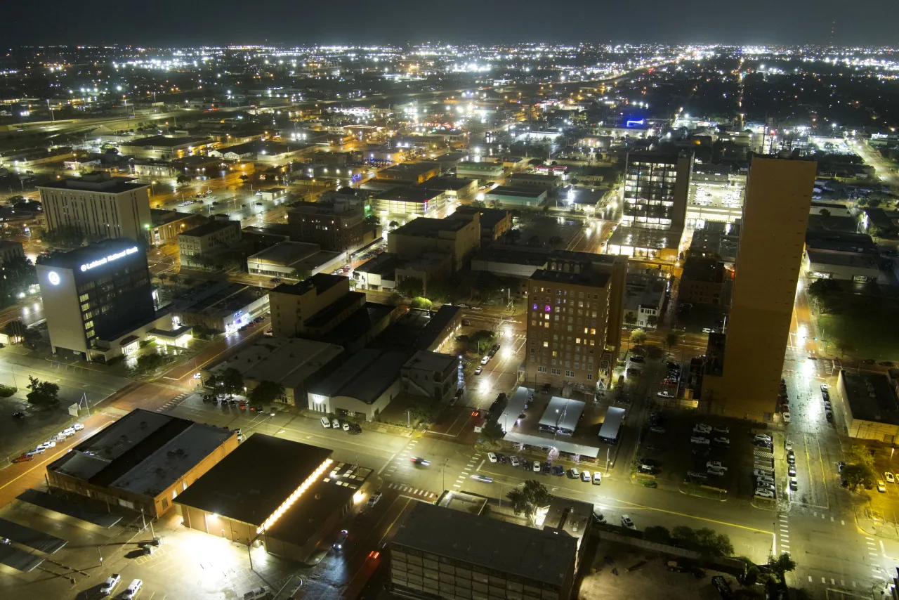 Aerial view of downtown Lubbock lit up at night