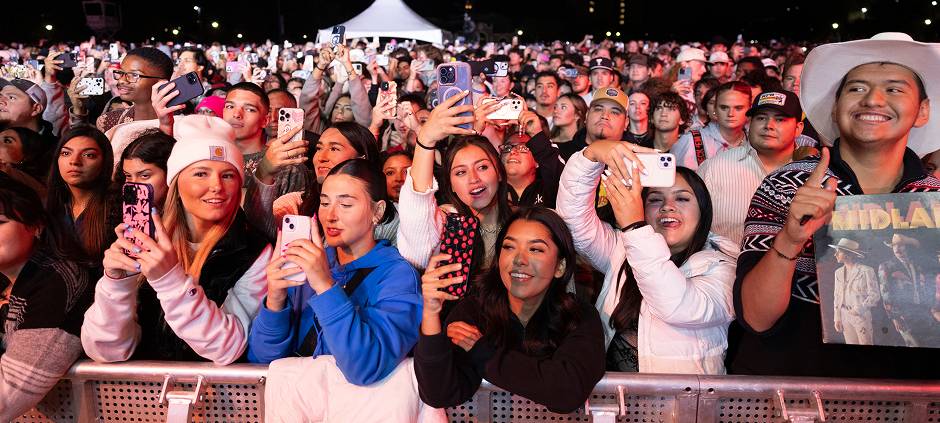 A crowd of students at a concert.