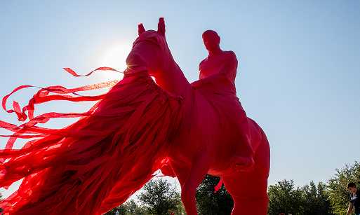 Will Rogers statue wrapped up in red for Texas Tech gameday