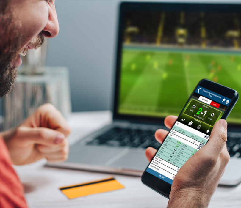 Man participating in online gambling