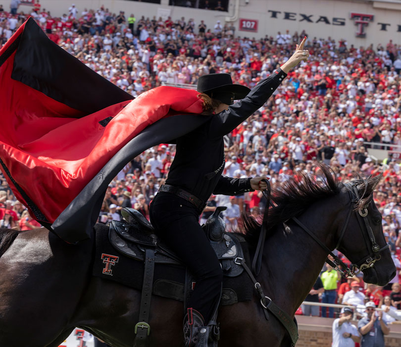 masked rider on football field