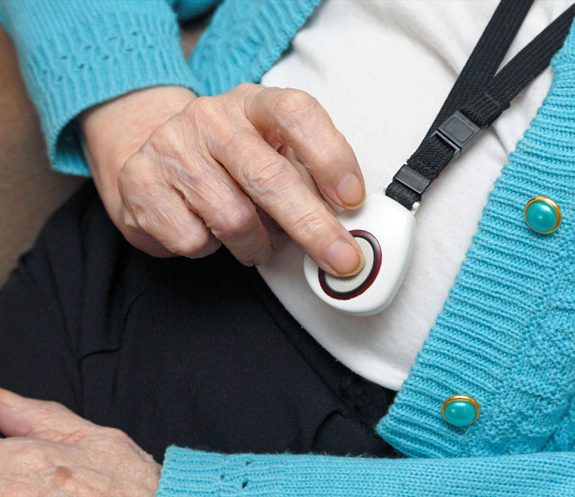 Elderly woman with lifealert lanyard