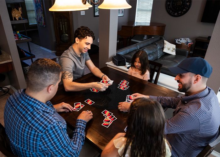 Rohena's family playing uno