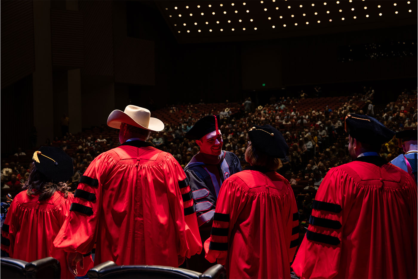 View of graduates from behind