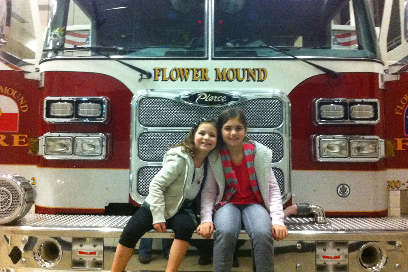 Kendall and Kylee on fire truck