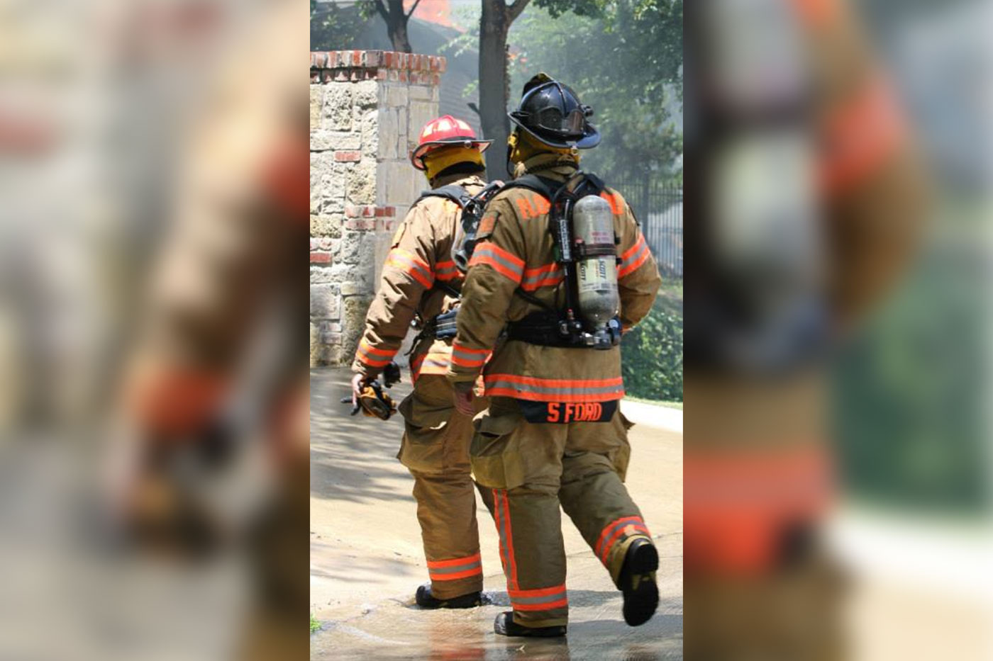 Steven Ford with fire hose