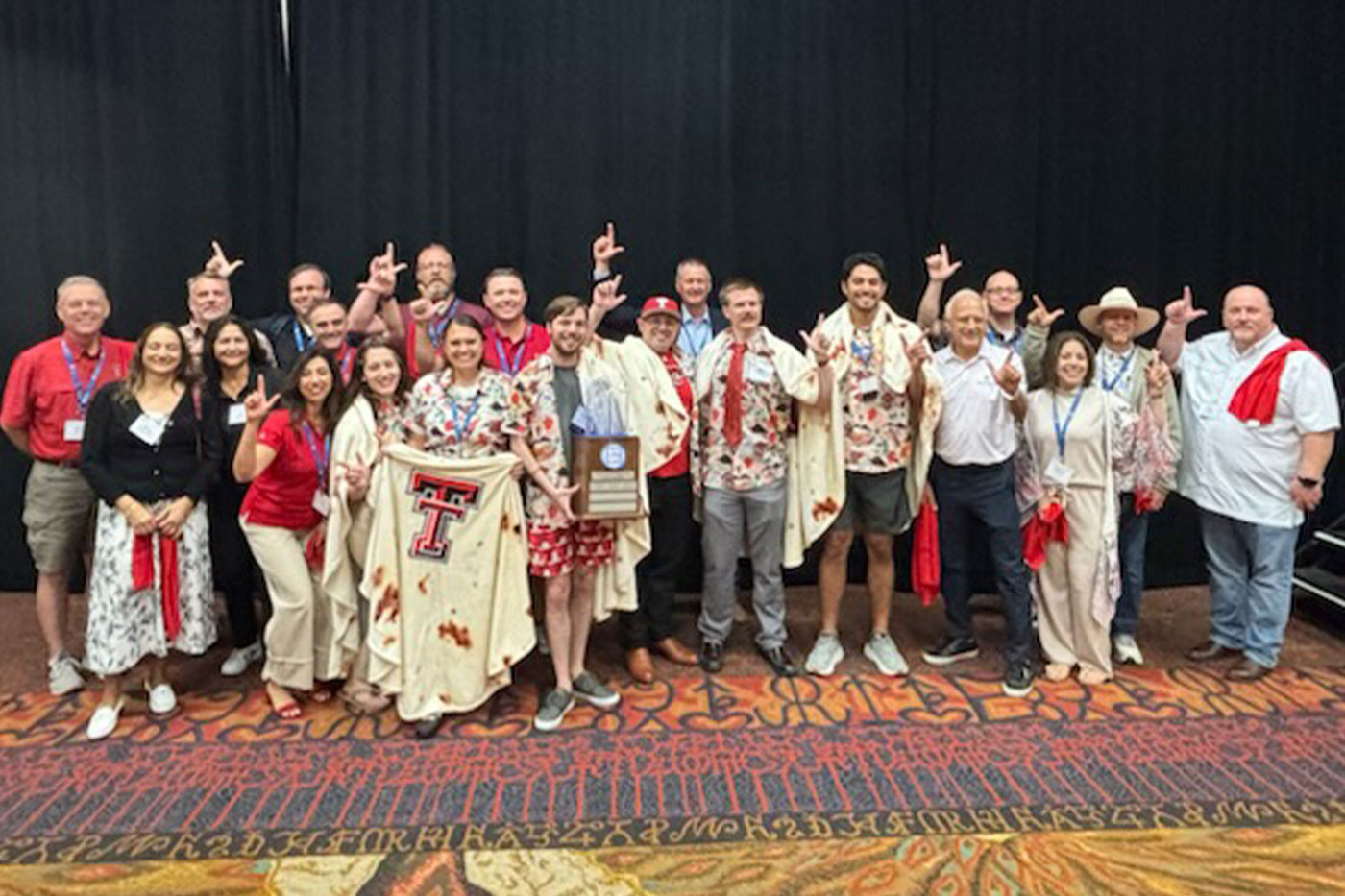 The MPA team celebrates its ICB victory with Texas Tech alumni at the 2025 Texas City Management Association conference.