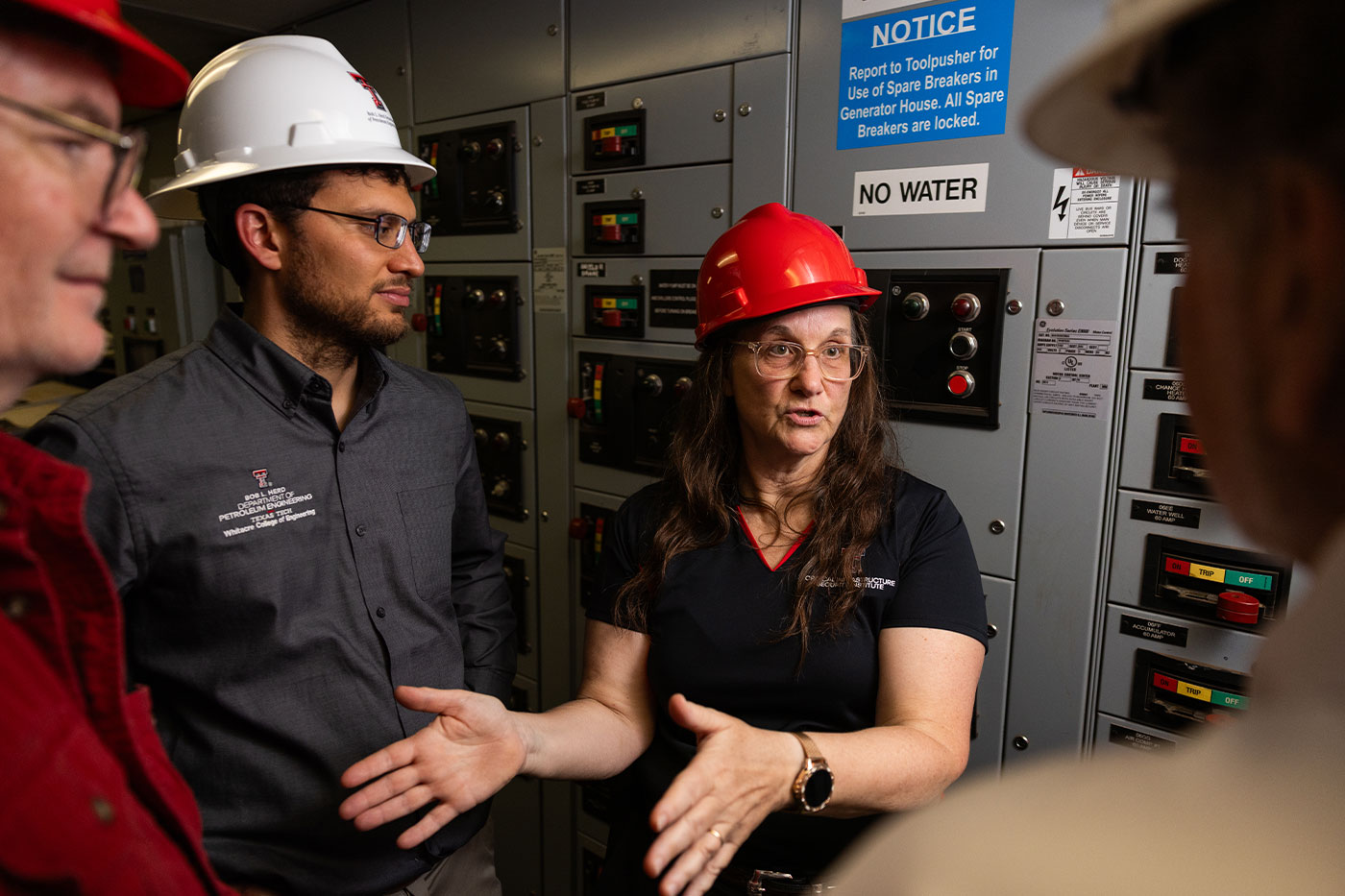 Brenda Connor talking to a group of engineers.