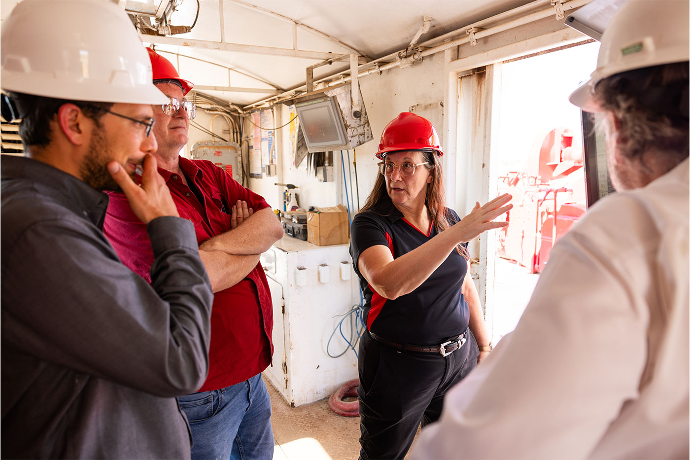 Brenda Connor speaking to a group of engineers. 