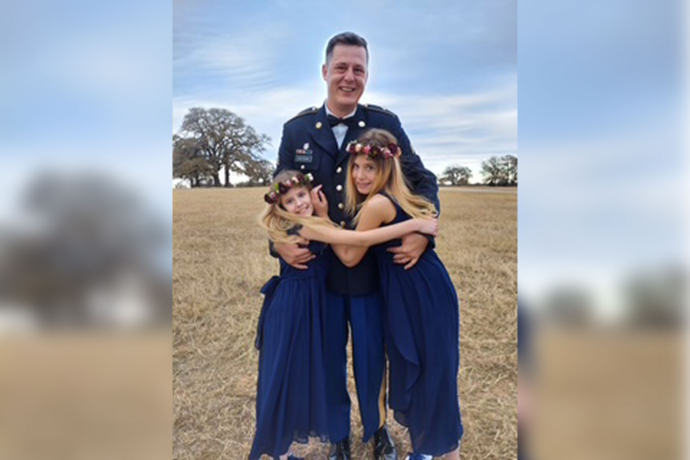 Dotson with two of his three girls