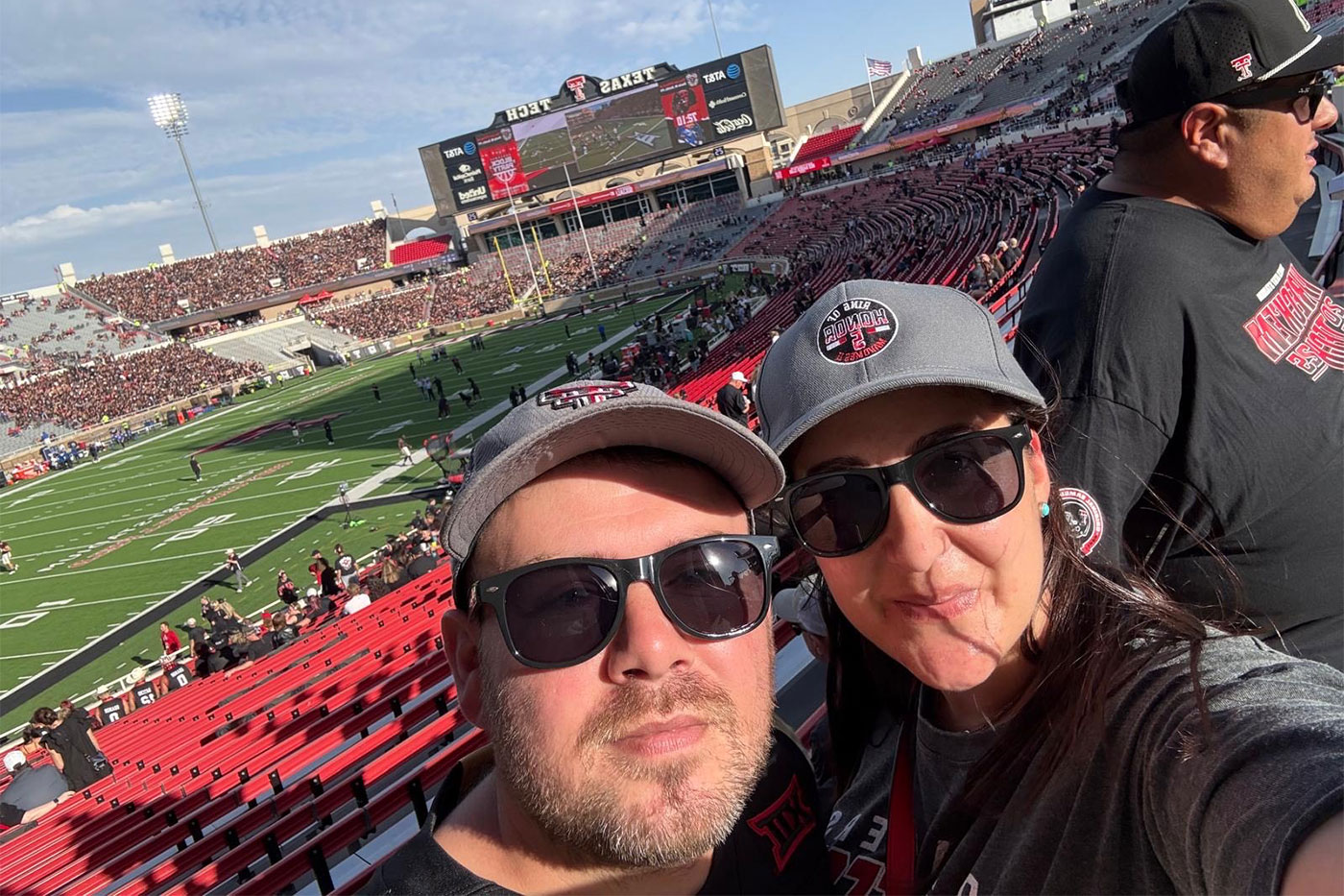 At the game, before kickoff.