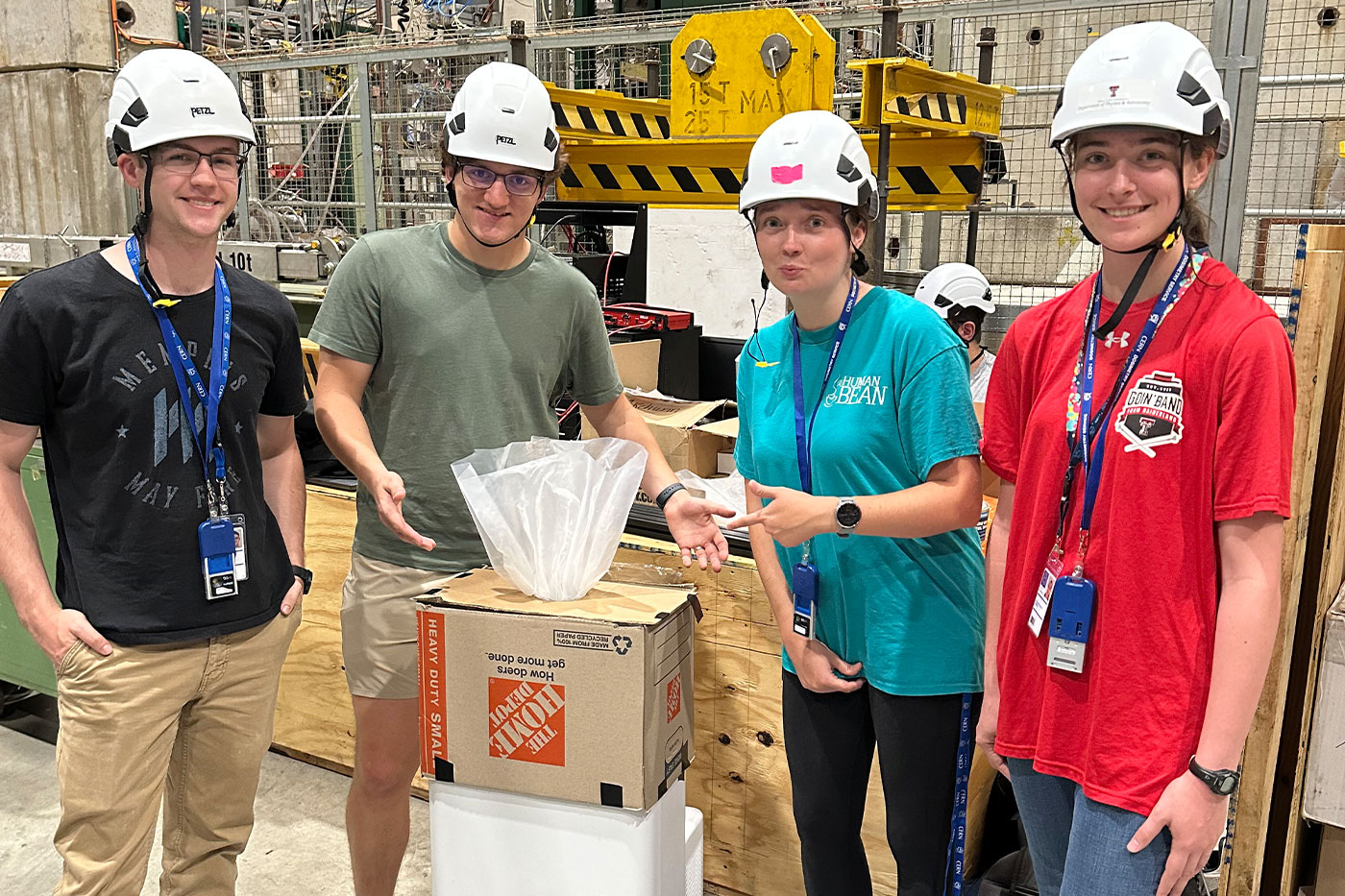 Harry Brittan, Michael O’Donnell, Caitlin Tidmore and Elizabeth Veraa (far right), design a makeshift air conditioner to cool the electronics. 