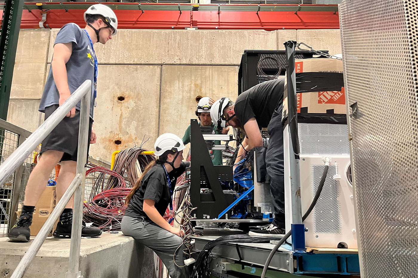 Harris (center), Harry Brittan, Caitlin Tidmore, Xander Delashaw