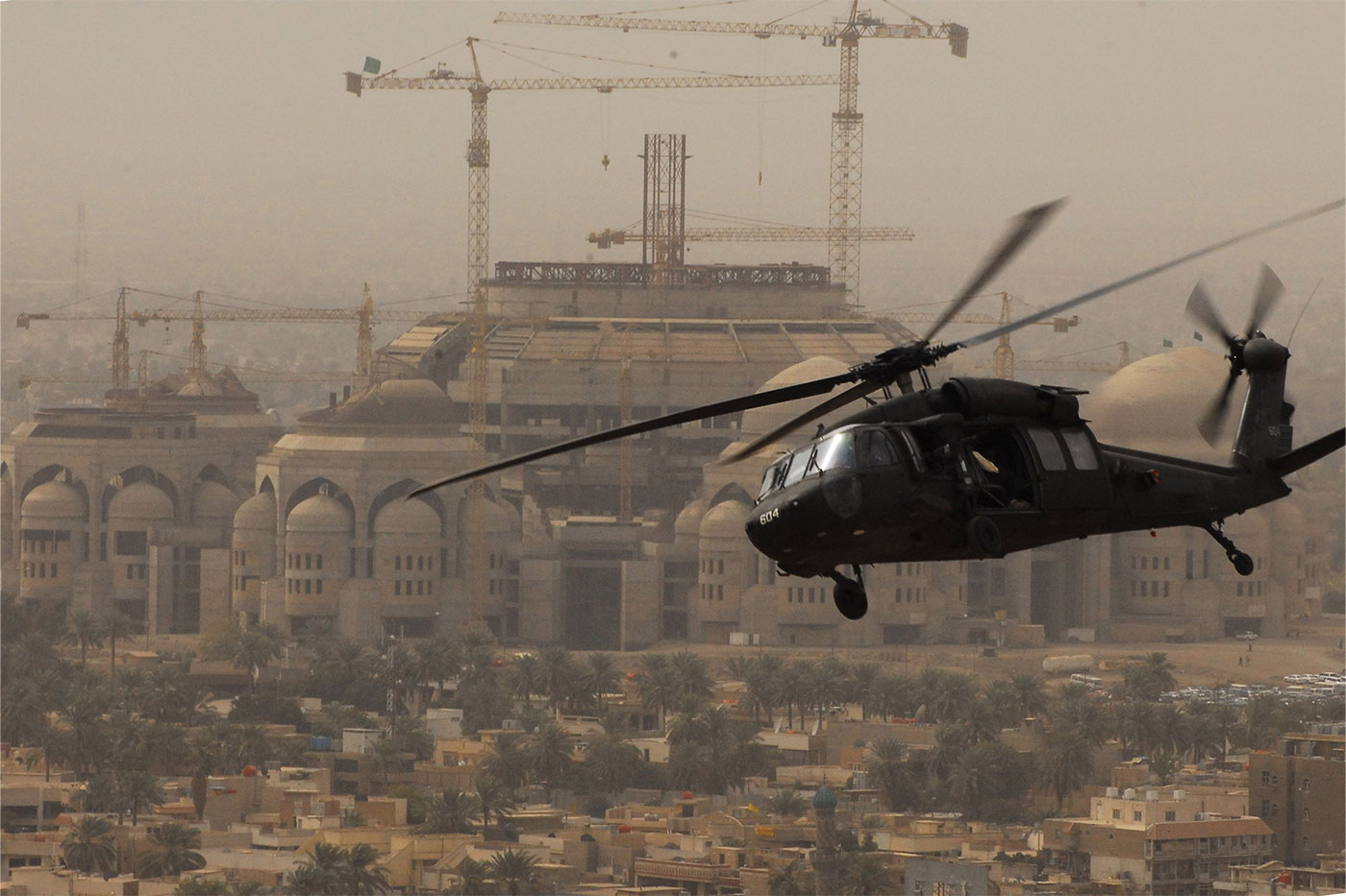 Mason flying over Baghdad, Iraq, in 2009.