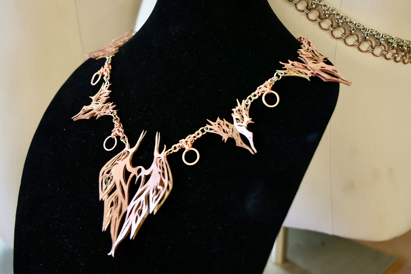 Alex's Project: a necklace on a mannequin