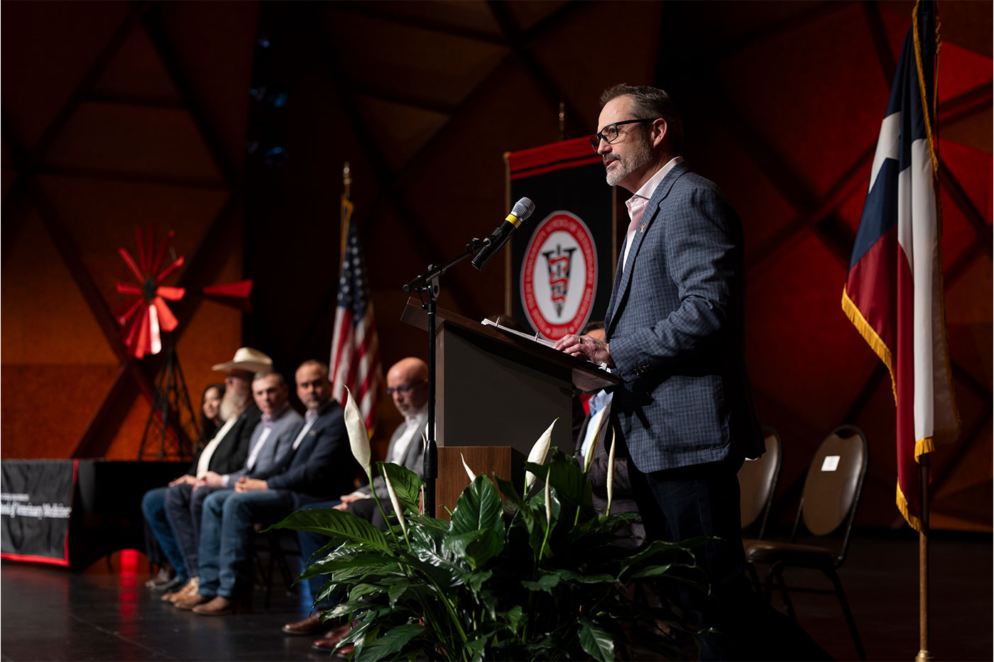 Guy Loneragan at a podium