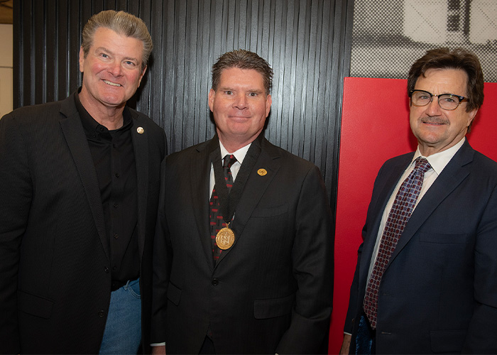 Shane C. Blum with Chancellor Mitchell and President Schovanec