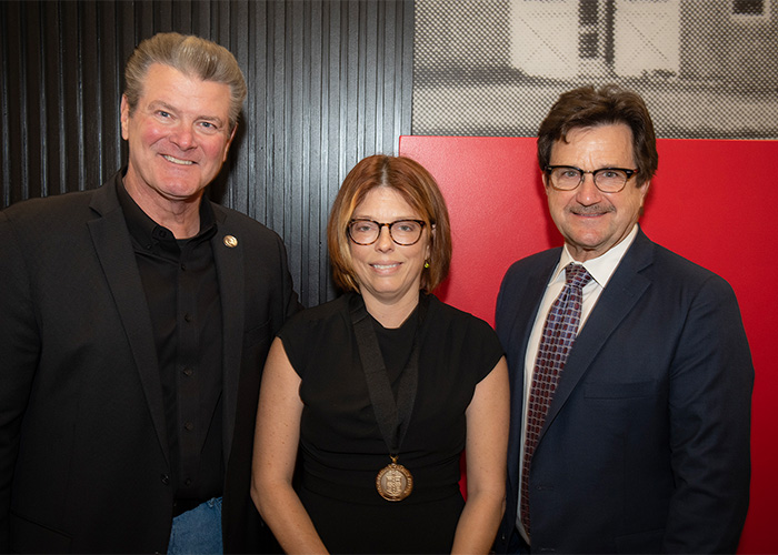 Jennifer Guelfo with Chancellor Mitchell and President Schovanec