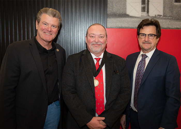 Darren Hudson with Chancellor Mitchell and President Schovanec