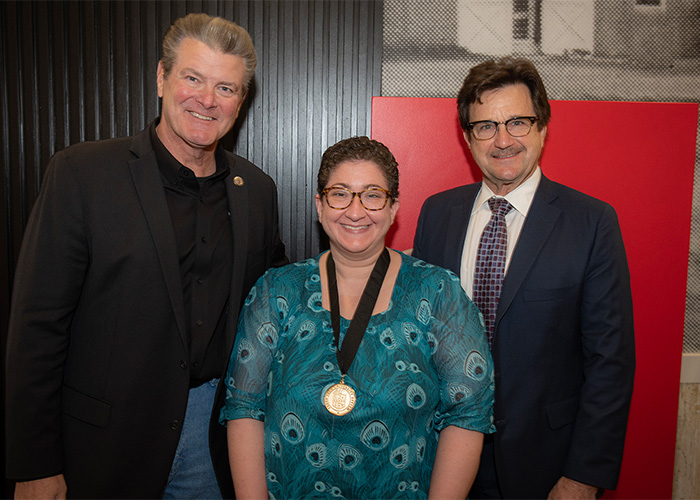 Sarah E. Victor with Chancellor Mitchell and President Schovanec