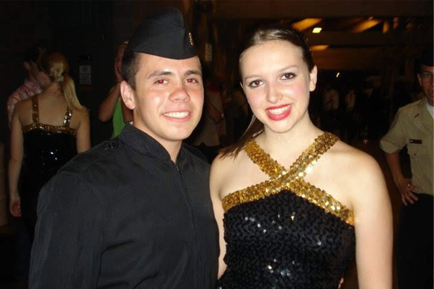 Josh in ROTC uniform and Gini in pom uniform. 