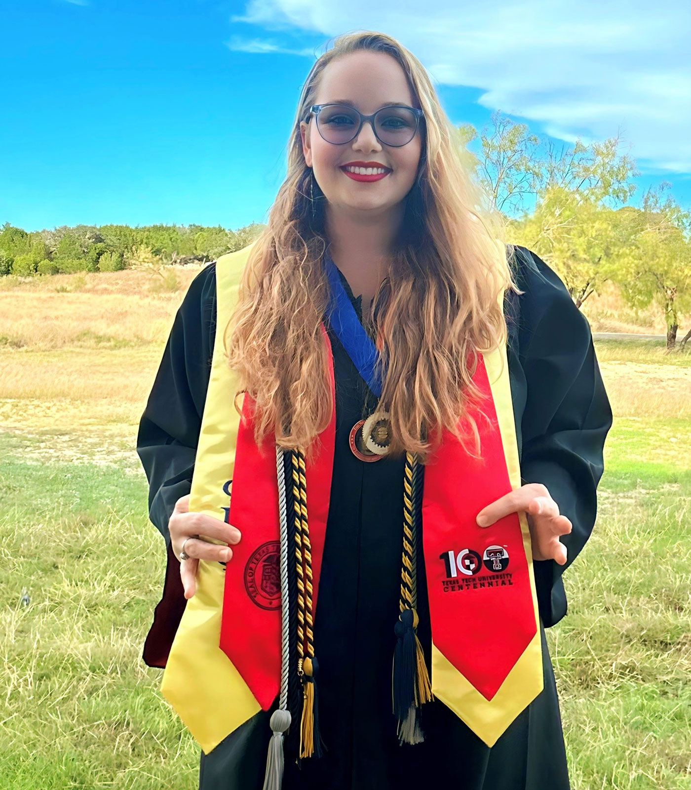 Casey in her commencement gown from the front. 