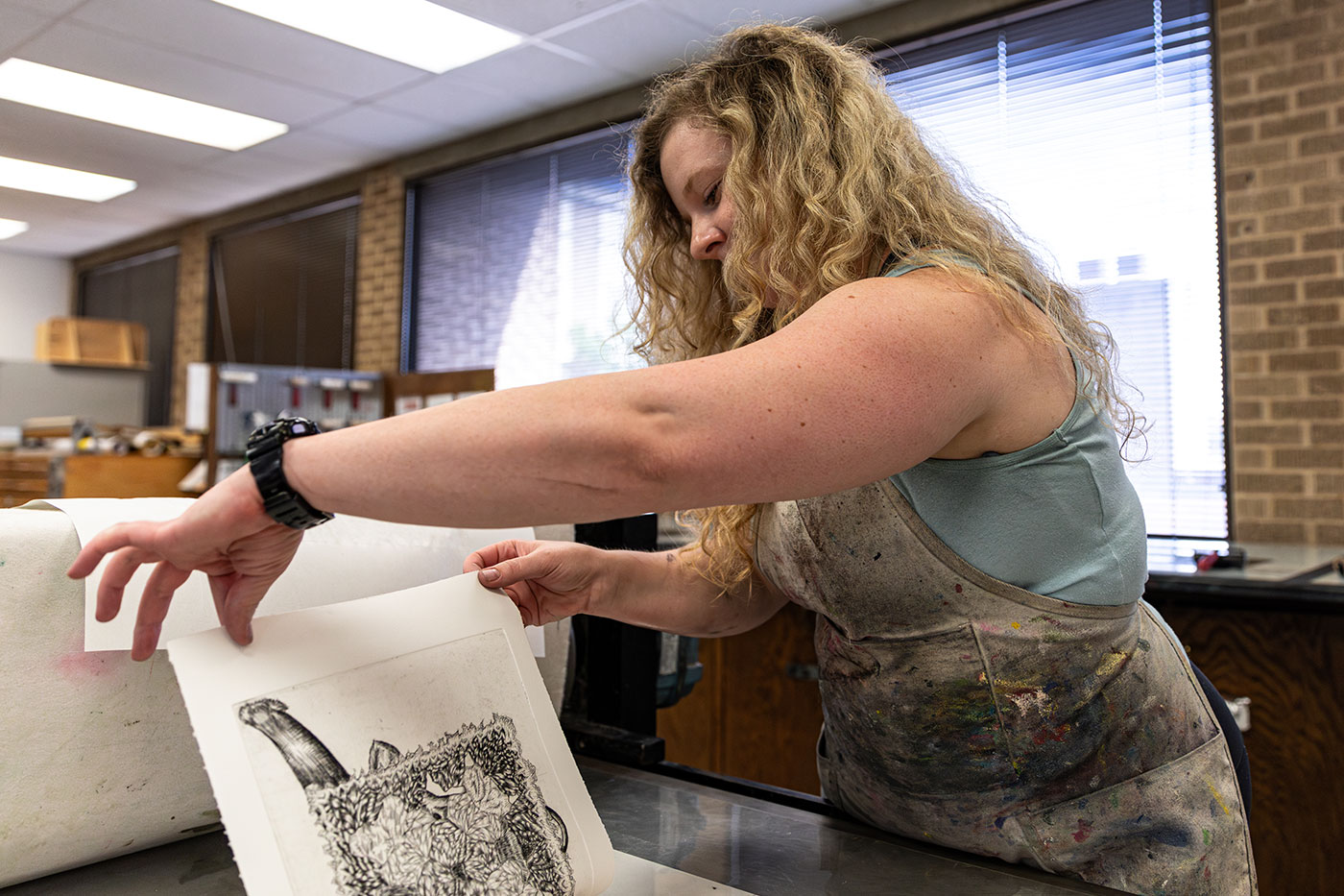 Hannah Roehr looking at a recent work. 