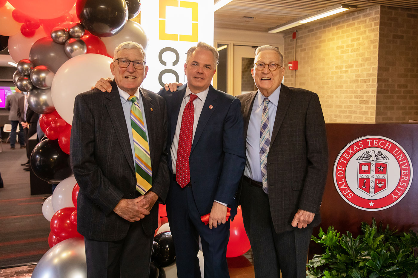 Jim White (left) with Chris Huckabee and John White (right)