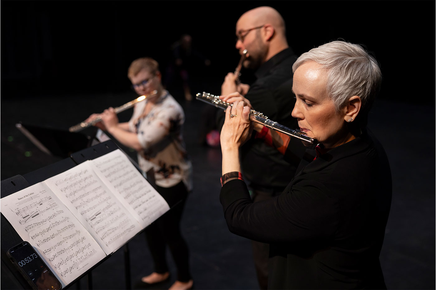 Three flautists.