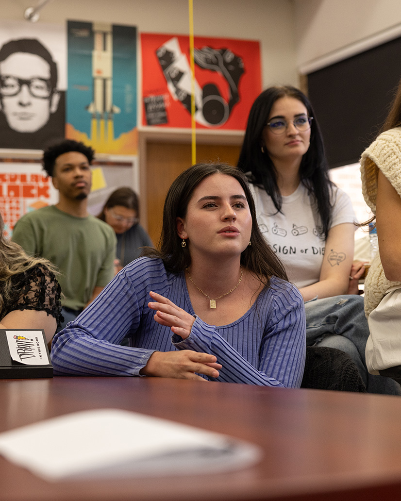 Students sitting in graphic design classroom.