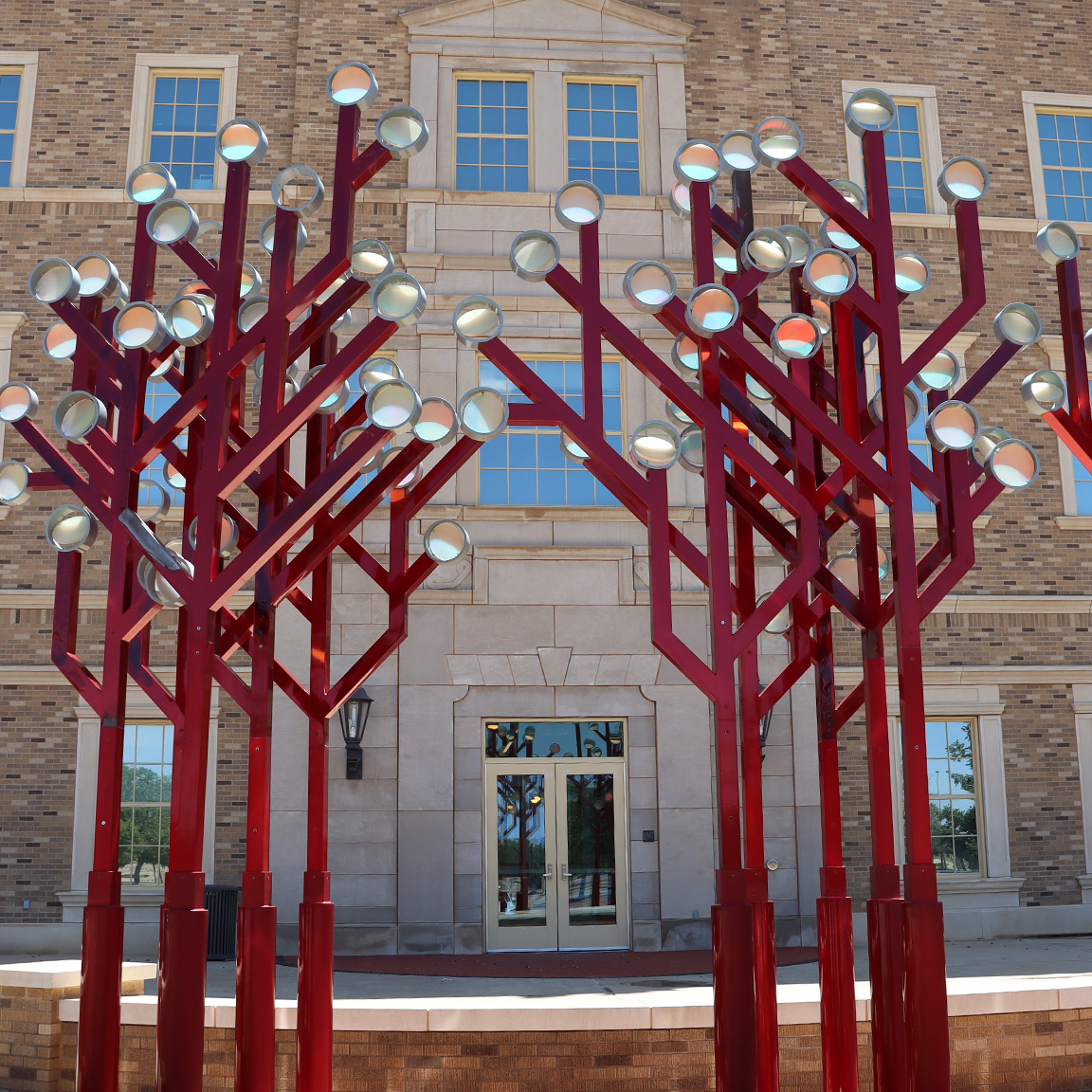 Students walk outside Rawls College of Business