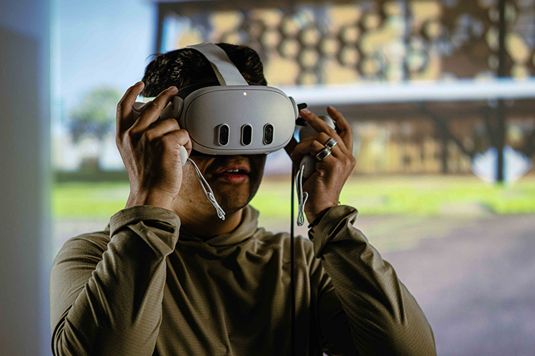 Student wearing virtual reality headset.